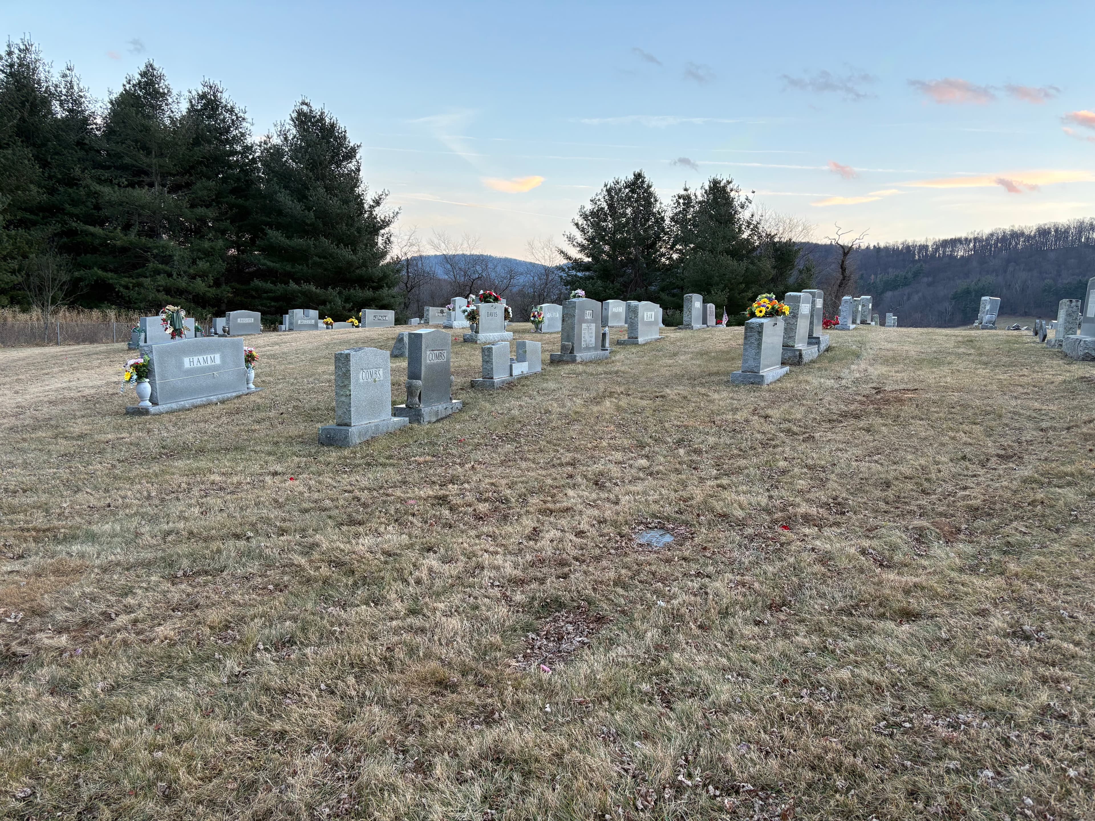 Church grave markers and surrounding landscape
